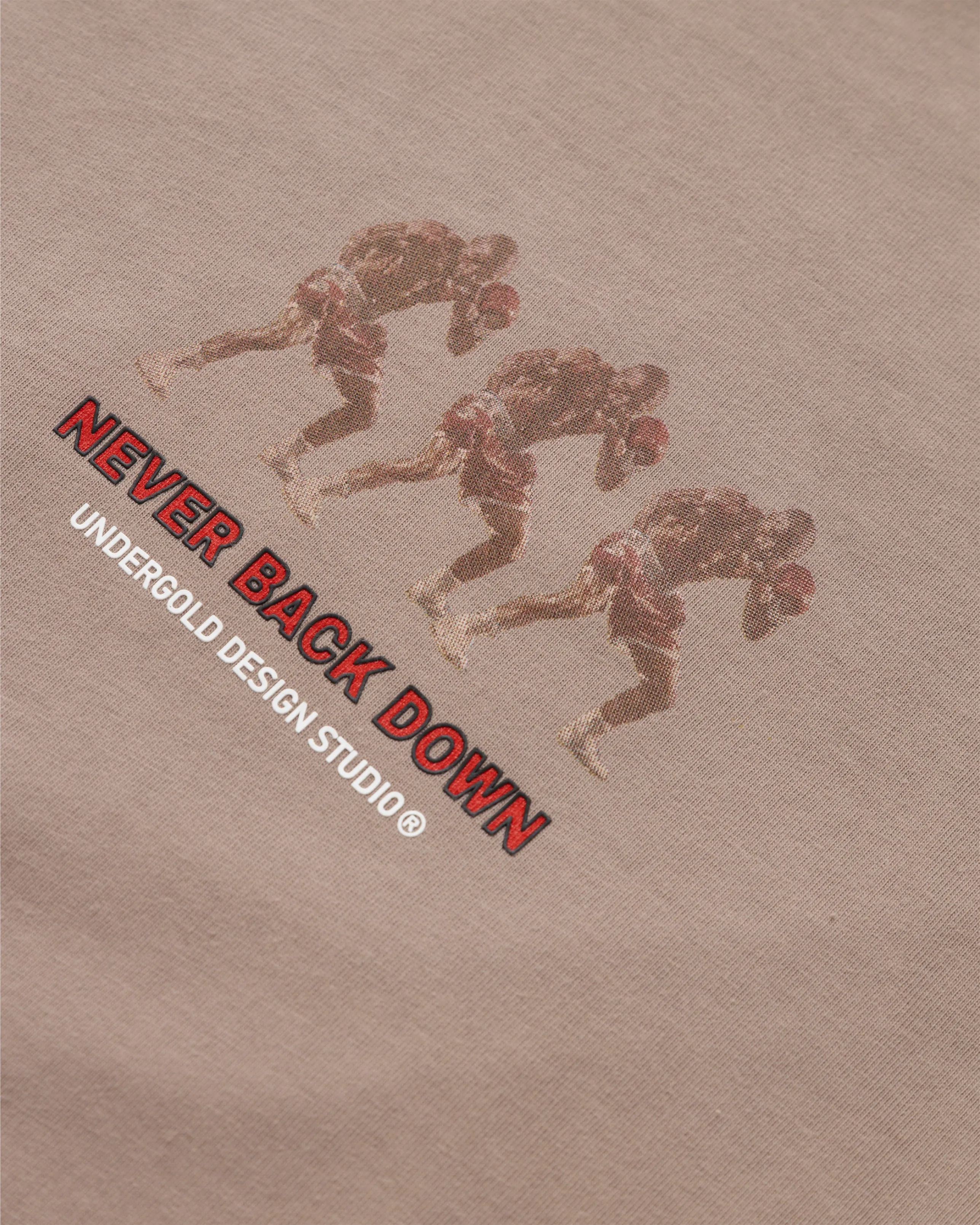 DREAMERS NEVER BACK DOWN TSHIRT BROWN