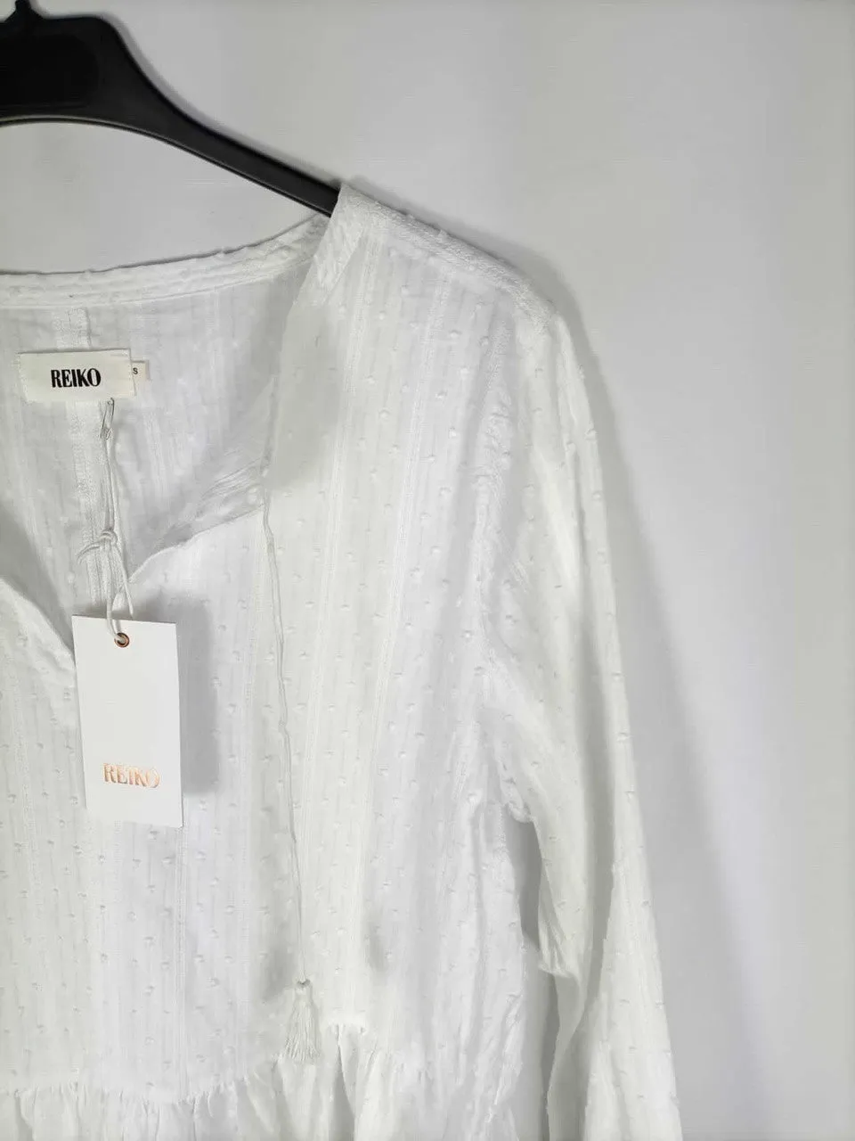 REIKO.Blusa blanca plumeti T.s